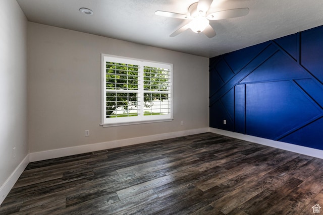 3380 S 930 W, Syracuse, UT 84075 - spare room featuring dark wood-style floors, ceiling fan, and baseboards