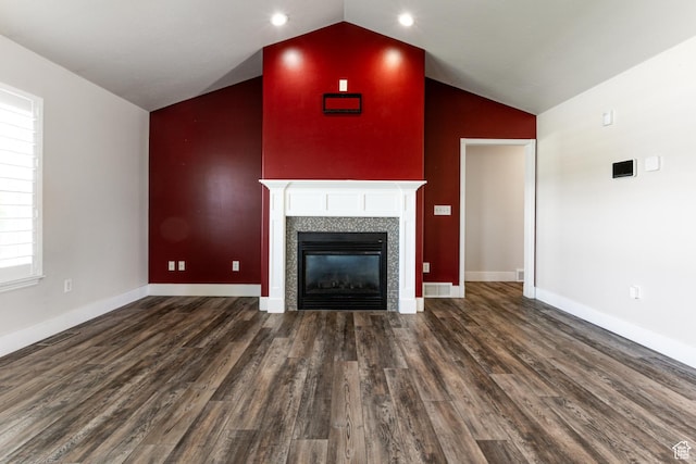 3380 S 930 W, Syracuse, UT 84075 - unfurnished living room featuring wood finished floors, a fireplace, baseboards, and high vaulted ceiling