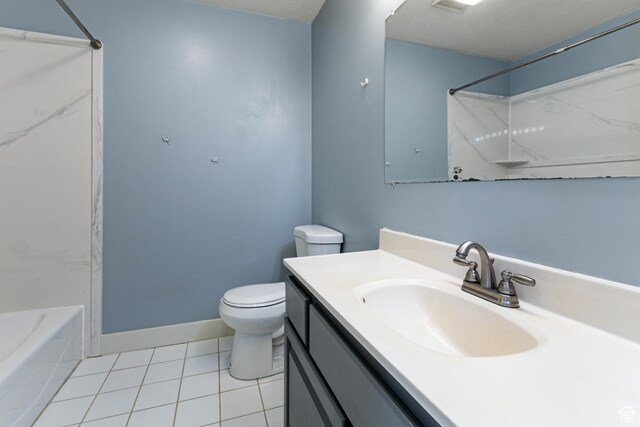 3380 S 930 W, Syracuse, UT 84075 - bathroom with vanity, toilet, tile patterned floors, shower / washtub combination, and baseboards