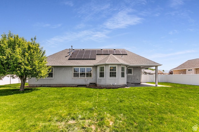 3380 S 930 W, Syracuse, UT 84075 - back of house featuring a shingled roof, solar panels, and a patio