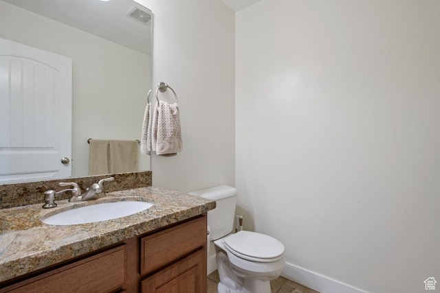 3638 S Blazing Oak Dr, Magna, UT 84044 - bathroom featuring toilet, vanity, and tile patterned floors