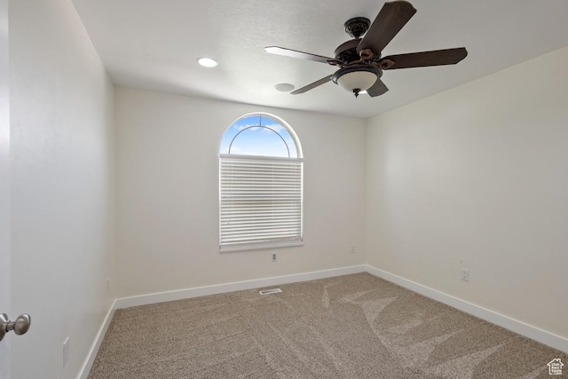 3638 S Blazing Oak Dr, Magna, UT 84044 - unfurnished room featuring ceiling fan, carpet flooring, and baseboards