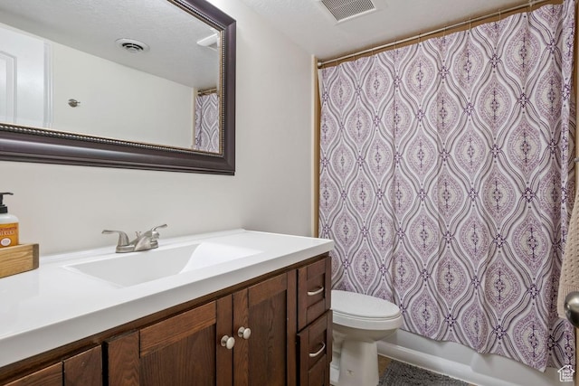 3638 S Blazing Oak Dr, Magna, UT 84044 - bathroom featuring vanity, toilet, and a shower with shower curtain