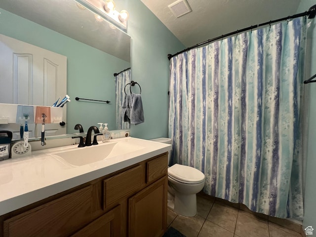 865 E 980 N, Tooele, UT 84074 - bathroom with tile patterned floors, toilet, and vanity