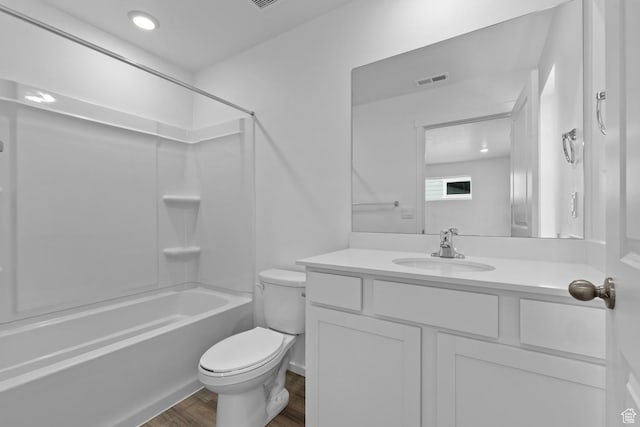 1889 E Thunder Ln Unit 496, Eagle Mountain, UT 84005 - full bathroom featuring toilet, vanity, wood finished floors, and shower / washtub combination