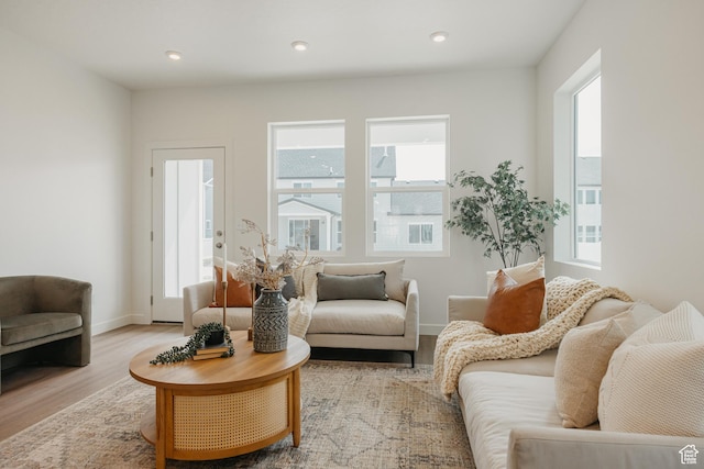 4625 N Fallow Way Unit 513, Eagle Mountain, UT 84005 - living area with light wood-type flooring, baseboards, and recessed lighting