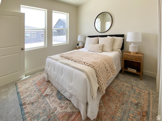 4625 N Fallow Way Unit 513, Eagle Mountain, UT 84005 - bedroom with carpet flooring, multiple windows, and baseboards