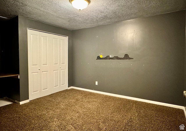 246 N 2800 E, Layton, UT 84040 - unfurnished bedroom with carpet flooring, a closet, and a textured ceiling