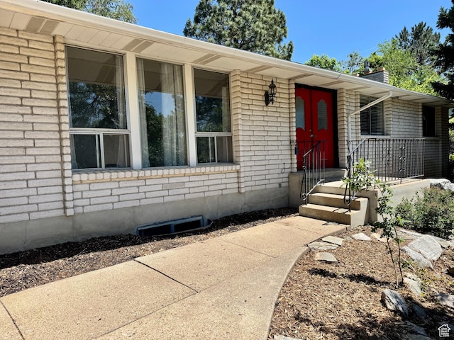 246 N 2800 E, Layton, UT 84040 - view of front of property featuring brick siding and a chimney