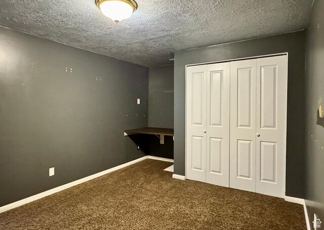 246 N 2800 E, Layton, UT 84040 - unfurnished bedroom featuring carpet floors, a closet, and a textured ceiling
