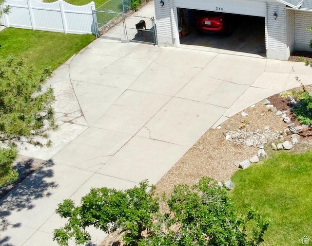 246 N 2800 E, Layton, UT 84040 - garage with a gate and concrete driveway