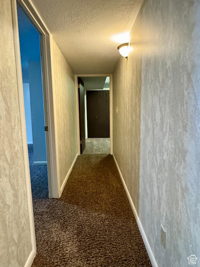 246 N 2800 E, Layton, UT 84040 - hallway featuring a textured ceiling and carpet flooring