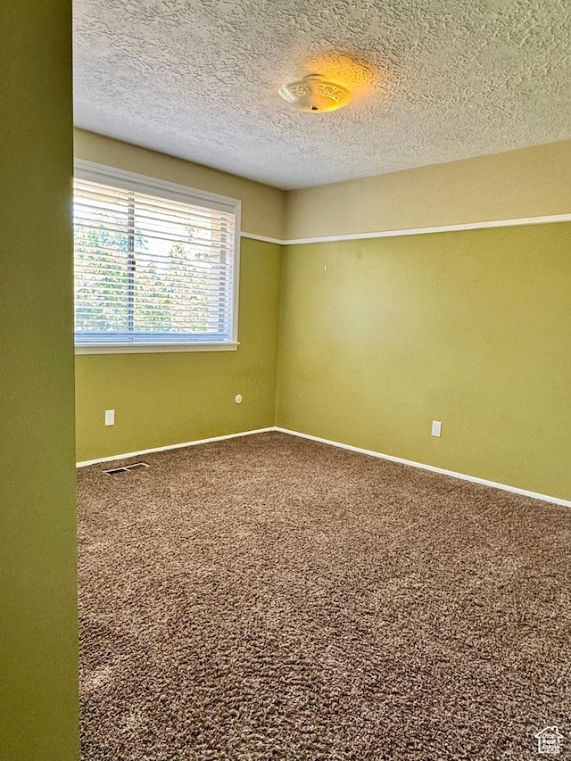 246 N 2800 E, Layton, UT 84040 - carpeted spare room featuring a textured ceiling and baseboards