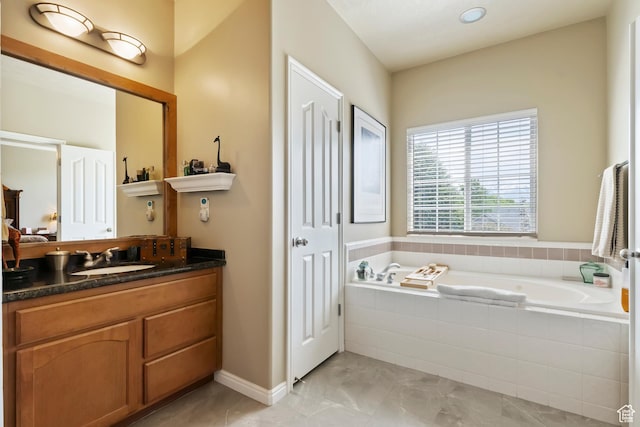 6512 S Timpanogos Way W, Taylorsville, UT 84129 - bathroom with a garden tub, vanity, and marble finish flooring