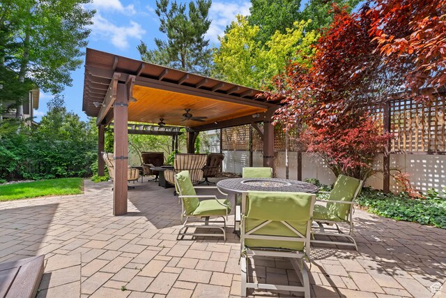 6512 S Timpanogos Way W, Taylorsville, UT 84129 - view of patio / terrace featuring ceiling fan, a gazebo, and outdoor dining space