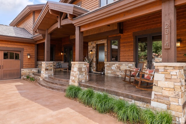 2314 E Flattop Mountain Dr Unit 89, Heber City, UT 84032 - porch with french doors and a garage