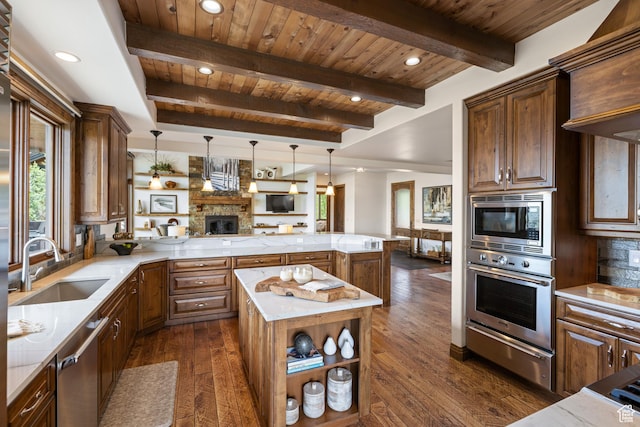 2314 E Flattop Mountain Dr Unit 89, Heber City, UT 84032 - kitchen featuring appliances with stainless steel finishes, a warming drawer, open floor plan, a sink, and dark wood-type flooring