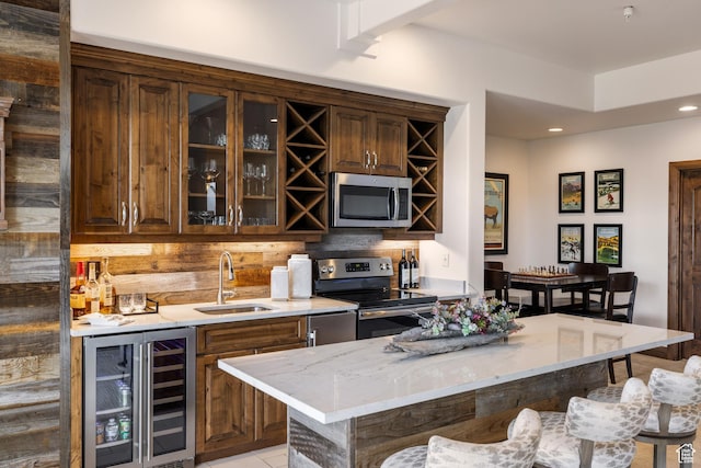 2314 E Flattop Mountain Dr Unit 89, Heber City, UT 84032 - indoor wet bar with wine cooler, appliances with stainless steel finishes, decorative backsplash, and recessed lighting