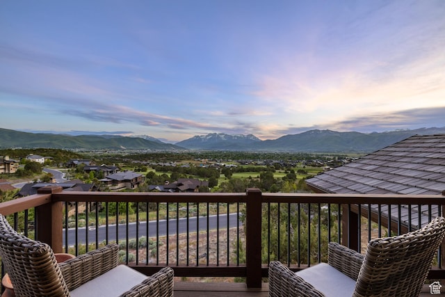 2314 E Flattop Mountain Dr Unit 89, Heber City, UT 84032 - deck at dusk with a mountain view
