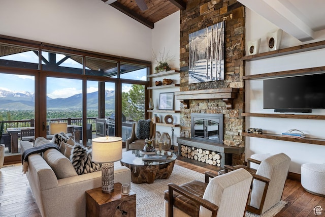 2314 E Flattop Mountain Dr Unit 89, Heber City, UT 84032 - living room with wood-type flooring, wooden ceiling with exposed beams, a mountain view, a stone fireplace, and high vaulted ceiling