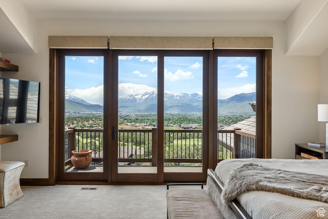 2314 E Flattop Mountain Dr Unit 89, Heber City, UT 84032 - carpeted bedroom featuring a mountain view, access to outside, and multiple windows