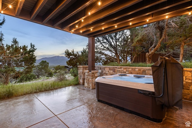 2314 E Flattop Mountain Dr Unit 89, Heber City, UT 84032 - view of patio / terrace featuring a hot tub and a mountain view