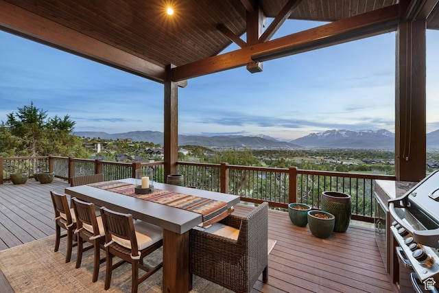 2314 E Flattop Mountain Dr Unit 89, Heber City, UT 84032 - wooden terrace featuring a mountain view, grilling area, and outdoor dining area