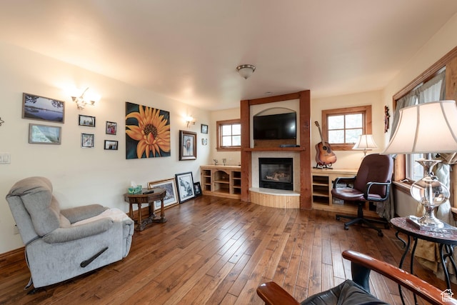 2003 Venus Ct, Park City, UT 84060 - living area with wood-type flooring, plenty of natural light, and a large fireplace