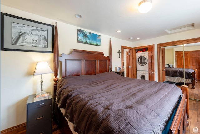 2003 Venus Ct, Park City, UT 84060 - bedroom featuring stacked washing machine and dryer, attic access, hardwood / wood-style floors, recessed lighting, and a closet