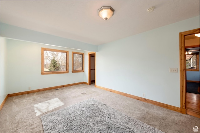 2003 Venus Ct, Park City, UT 84060 - unfurnished room with carpet flooring, baseboards, and plenty of natural light