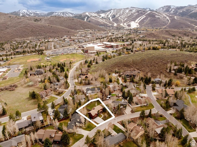 2003 Venus Ct, Park City, UT 84060 - aerial view of property's location featuring property boundaries highlighted, a mountainous background, and nearby suburban area