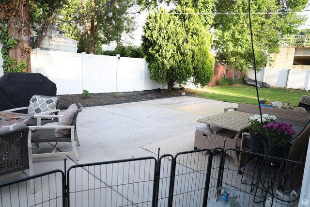 1834 E Cloverdale Rd S, Cottonwood Heights, UT 84121 - fenced backyard with area for grilling, a patio area, and a gate