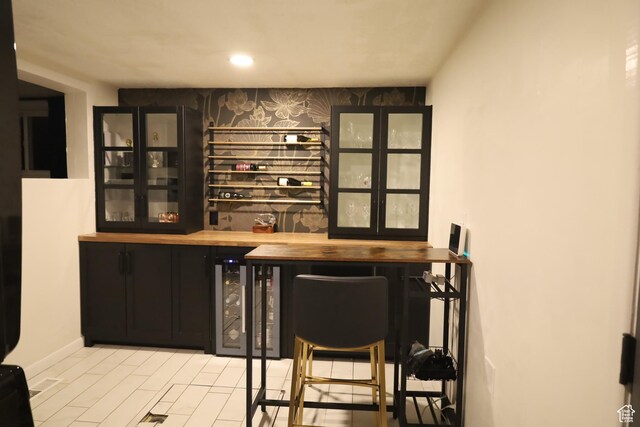 1834 E Cloverdale Rd S, Cottonwood Heights, UT 84121 - indoor dry bar with wine cooler and recessed lighting