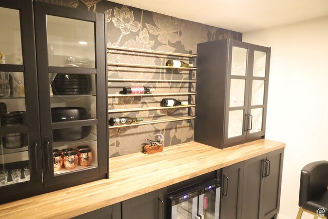 1834 E Cloverdale Rd S, Cottonwood Heights, UT 84121 - indoor dry bar featuring beverage cooler and wallpapered walls