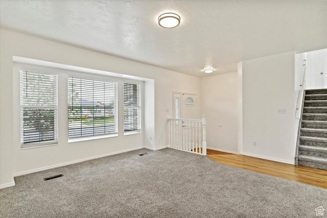 1134 N 2825 W, Layton, UT 84041 - carpeted spare room with baseboards and stairway