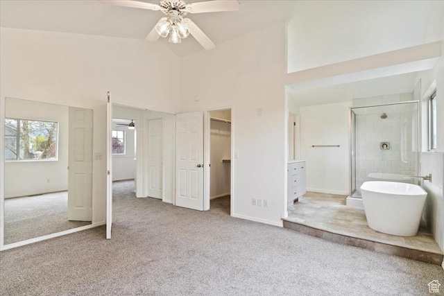 1134 N 2825 W, Layton, UT 84041 - bedroom with carpet floors, vaulted ceiling, a spacious closet, ensuite bathroom, and baseboards