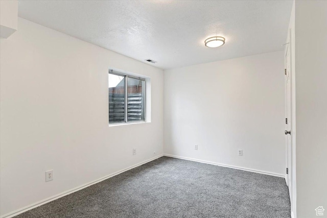 1134 N 2825 W, Layton, UT 84041 - spare room with carpet, baseboards, and a textured ceiling