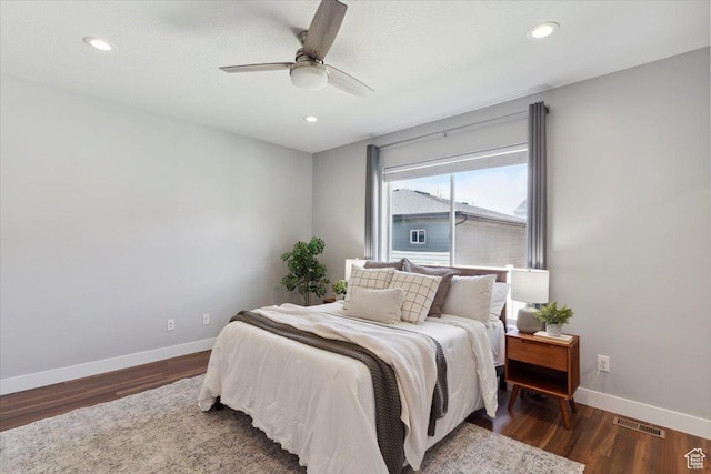 3222 W Harvard Dr, Mountain Green, UT 84050 - bedroom featuring baseboards, wood finished floors, recessed lighting, and a ceiling fan