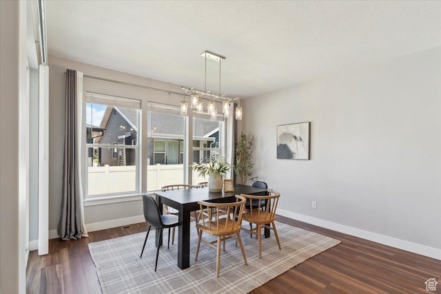 3222 W Harvard Dr, Mountain Green, UT 84050 - dining room with wood finished floors and baseboards