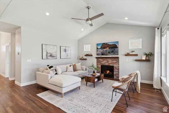 3222 W Harvard Dr, Mountain Green, UT 84050 - living area featuring baseboards, a brick fireplace, dark wood-style floors, lofted ceiling, and ceiling fan
