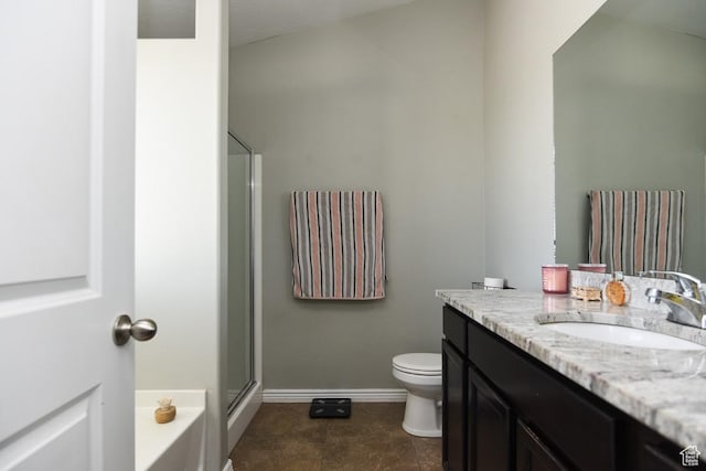 312 W 970 N, Tooele, UT 84074 - bathroom with vanity, toilet, an enclosed shower, baseboards, and a bathtub