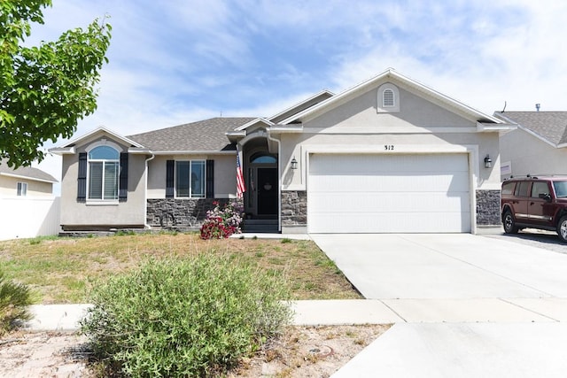 312 W 970 N, Tooele, UT 84074 - single story home with stucco siding, stone siding, driveway, and an attached garage