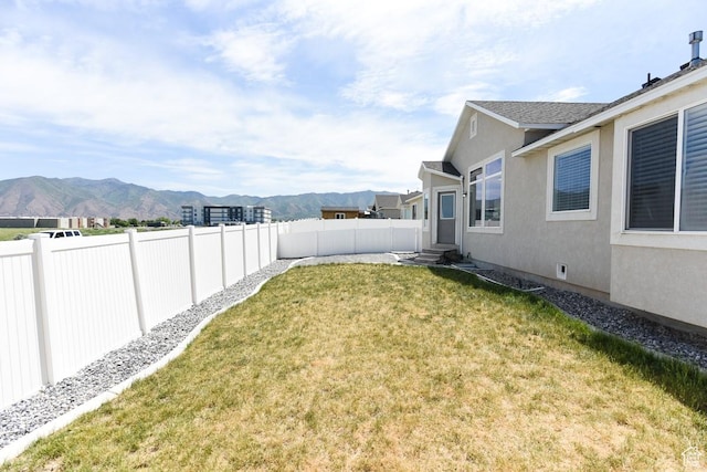 312 W 970 N, Tooele, UT 84074 - view of yard with a mountain view and entry steps