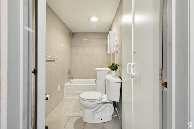 1095 N 100 W, Pleasant Grove, UT 84062 - bathroom featuring tile walls, tile patterned floors, toilet, and shower / washtub combination