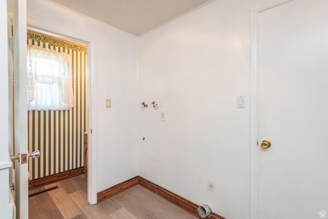 570 N Parkway Ave, Tooele, UT 84074 - laundry room featuring light wood finished floors and baseboards