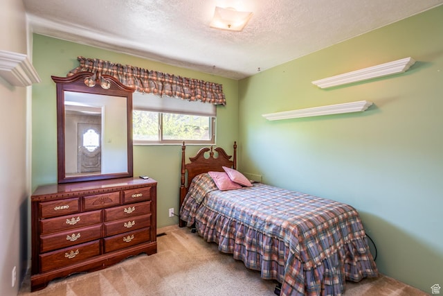 570 N Parkway Ave, Tooele, UT 84074 - carpeted bedroom featuring a textured ceiling