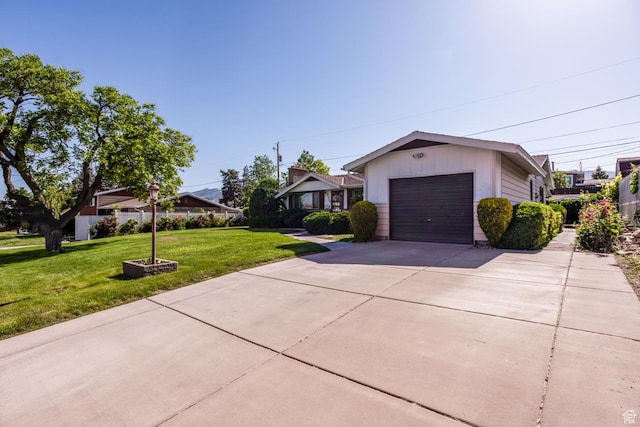 570 N Parkway Ave, Tooele, UT 84074 - single story home featuring driveway, an attached garage, and a front lawn