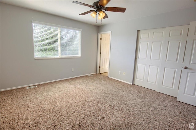 2086 S 50 E, Clearfield, UT 84015 - unfurnished bedroom with carpet floors, a closet, baseboards, and a ceiling fan
