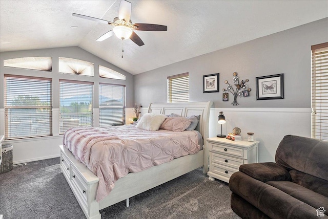 14263 S Morning Light Dr W, Herriman, UT 84065 - bedroom with dark colored carpet, multiple windows, vaulted ceiling, and ceiling fan