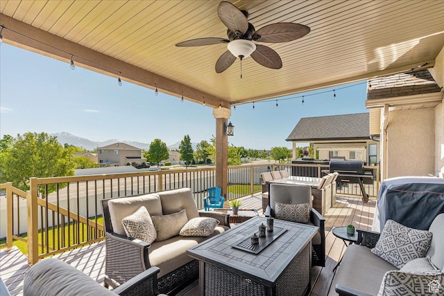 14263 S Morning Light Dr W, Herriman, UT 84065 - view of patio featuring an outdoor hangout area, a deck with mountain view, outdoor dining space, and a ceiling fan